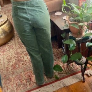Green pleated corduroy pants